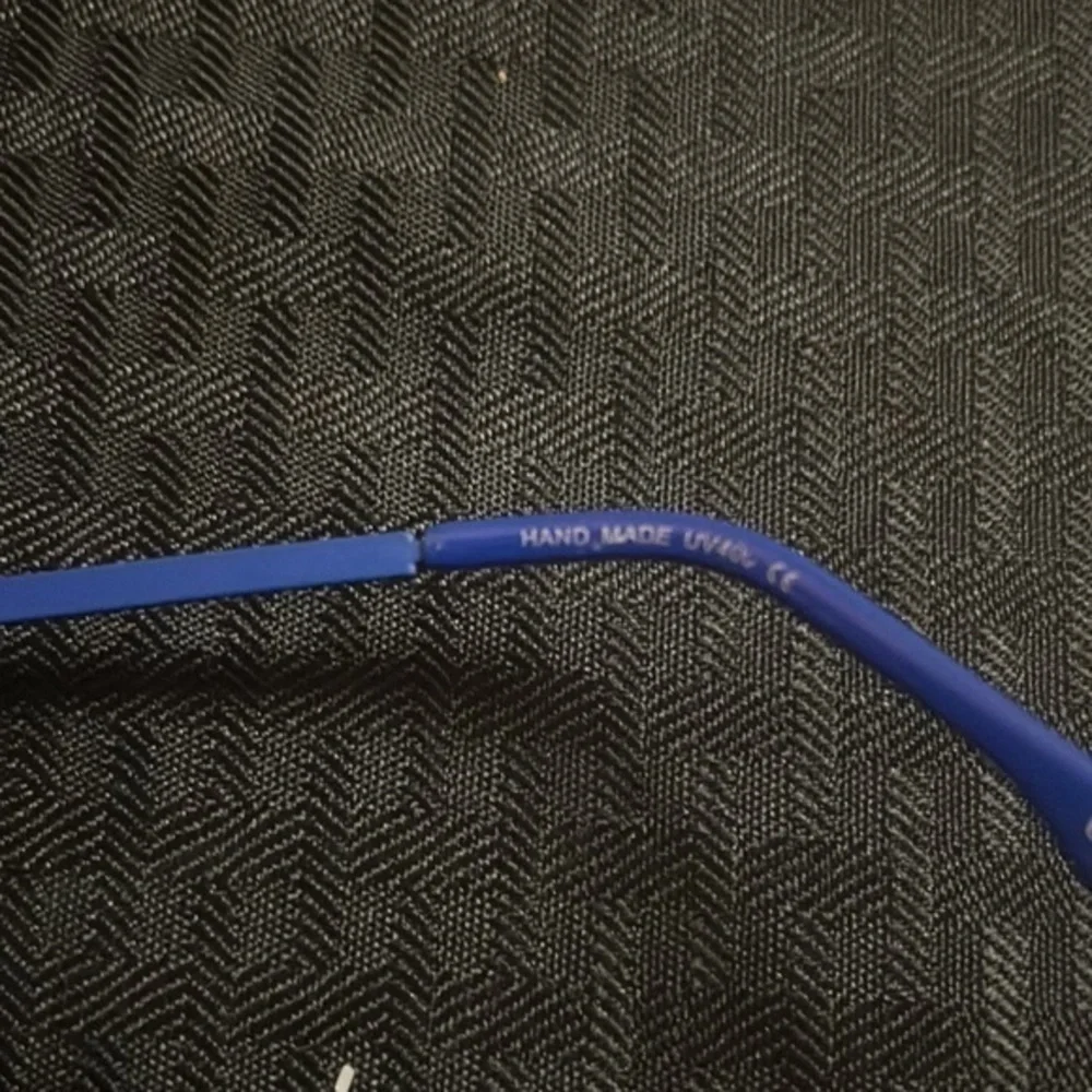 Royal blue plastic frame with metal arms. From Vooogue Me.